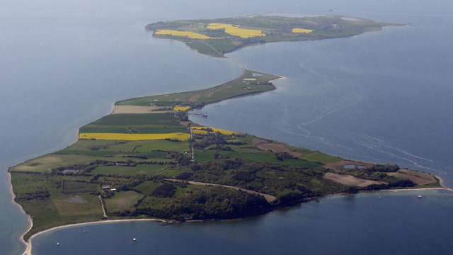 Two islands with green fields