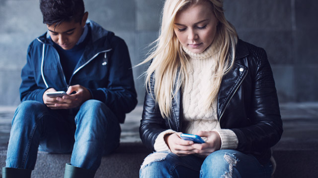 Teenagers texting SMALL