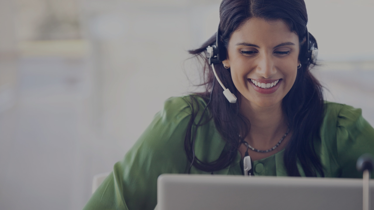 Woman wearing headset.