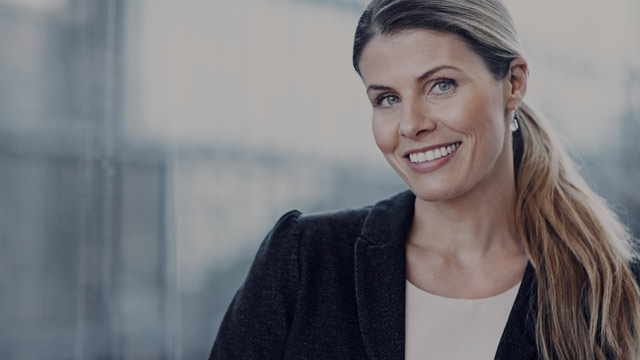 business woman in front of window 2 small overlay