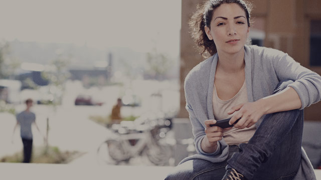 casual woman with phone outside 3 small overlay