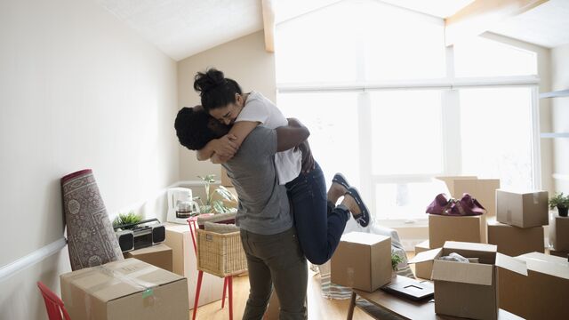 Happy couple in new home - small