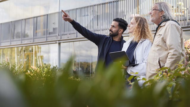 NAL-man-and-woman-outside-house-small